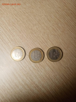 На оценку монеты 1 евро и 2 евро - IMG-20220302-WA0000