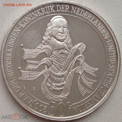 Монеты достоинством "50", выпущенные в странах Америки - н1